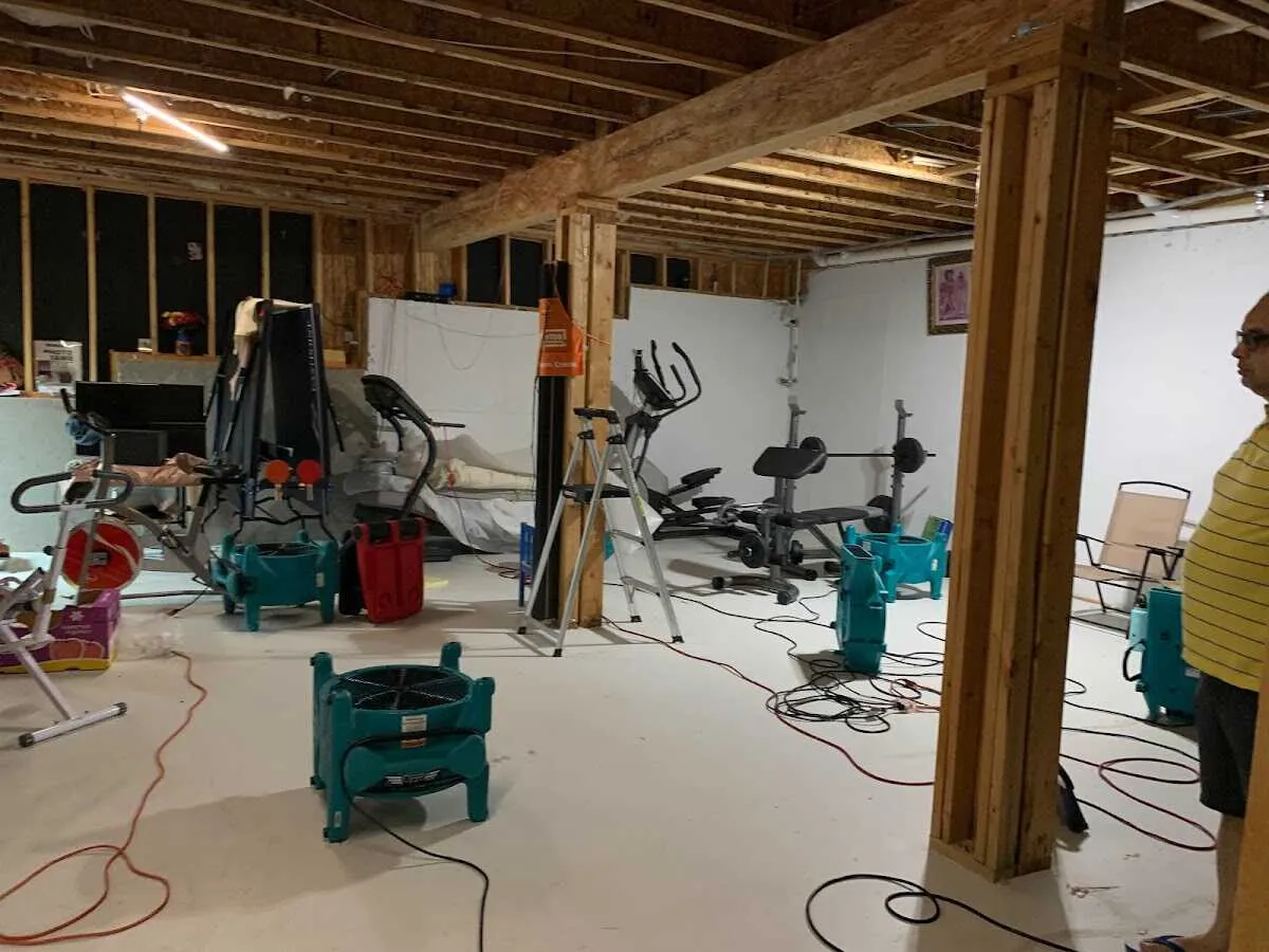 Basement drying equipment setup for Contents Cleaning & Restoration in Bondurant